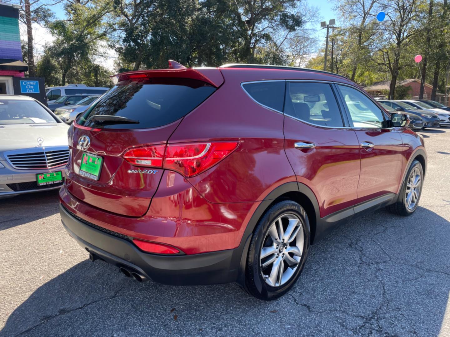 2013 RED HYUNDAI SANTA FE SPORT 2.0T (5XYZU3LA3DG) with an 2.0L engine, Automatic transmission, located at 5103 Dorchester Rd., Charleston, SC, 29418-5607, (843) 767-1122, 36.245171, -115.228050 - Leather, CD/AUX/Sat/Bluetooth, Dual Climate, Power Everything (windows, locks, seats, mirrors), Heated Seats, Rear Heated Seats, Push Button Start, Keyless Entry, Alloy Wheels. Local Trade-in!! Located at New Life Auto Sales! 2023 WINNER for Post & Courier's Charleston's Choice Pre-owned Car Dealer - Photo#6